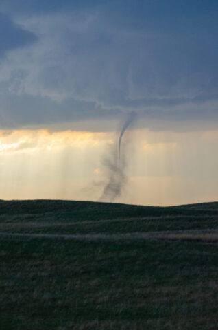 Landspout churning over open prairie in Nebraska